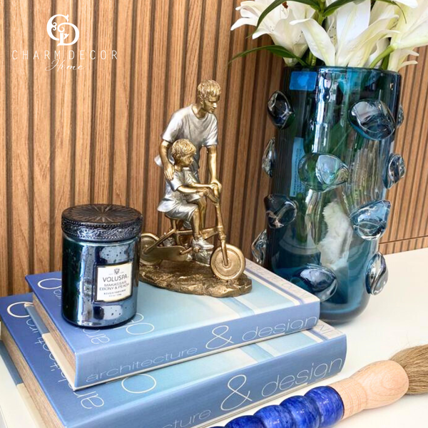 escultura decorativa pai com filho bicicleta 257 575